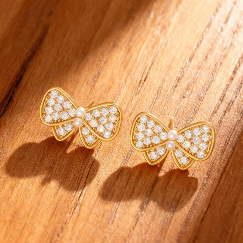 Pendientes Lazos Blancos con Dorado